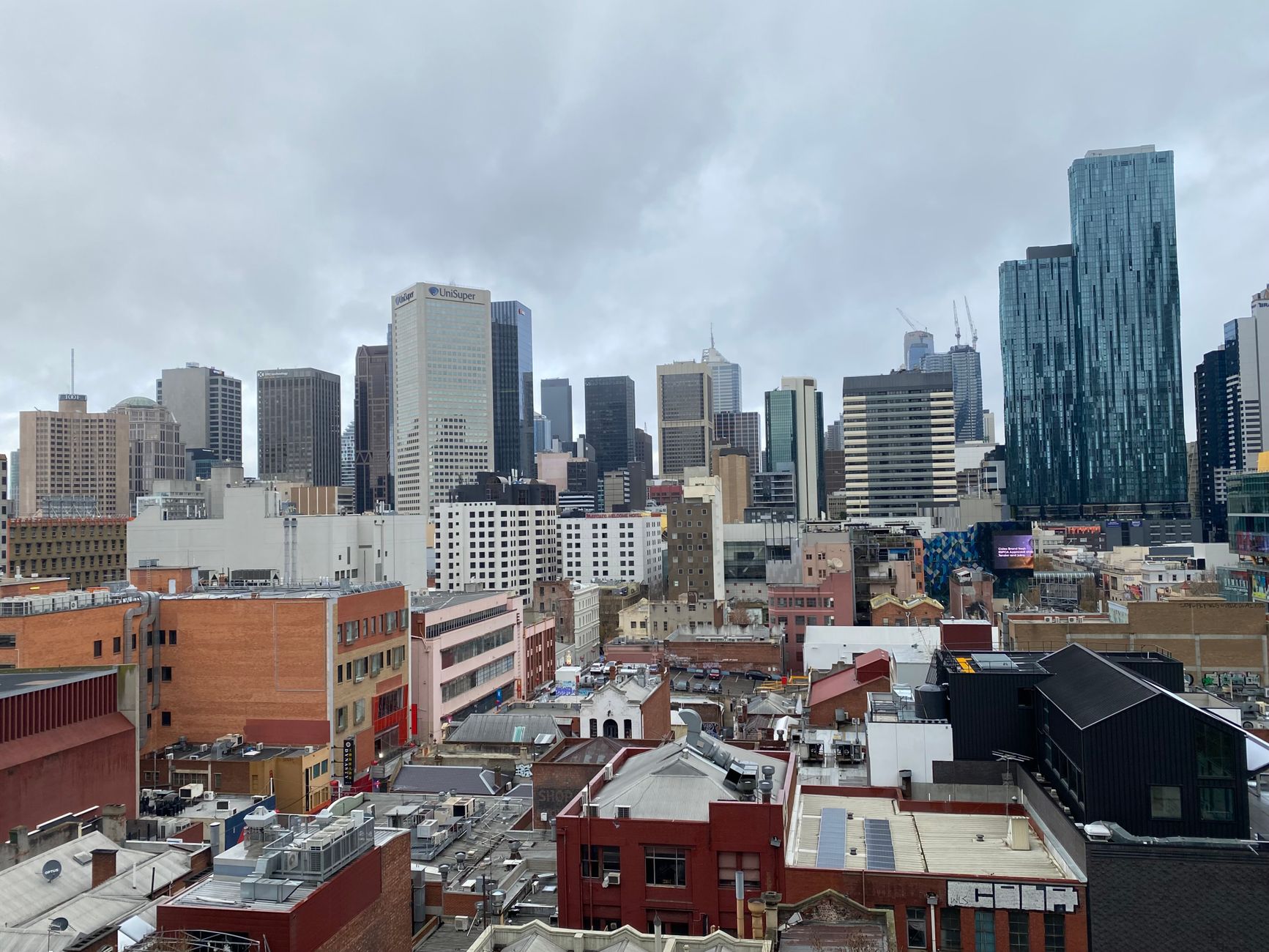 Melbourne skyline with digital web design elements overlay.